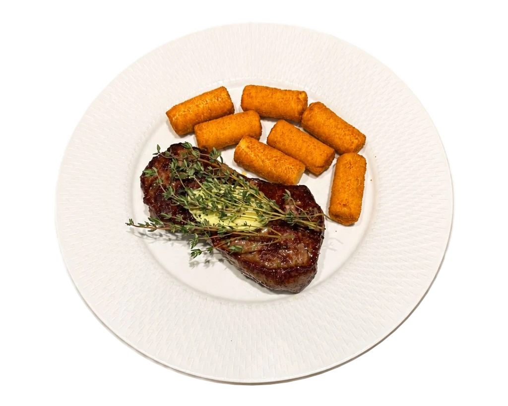Argentinisches Rumpsteak mit Kroketten und Pfeffersoße