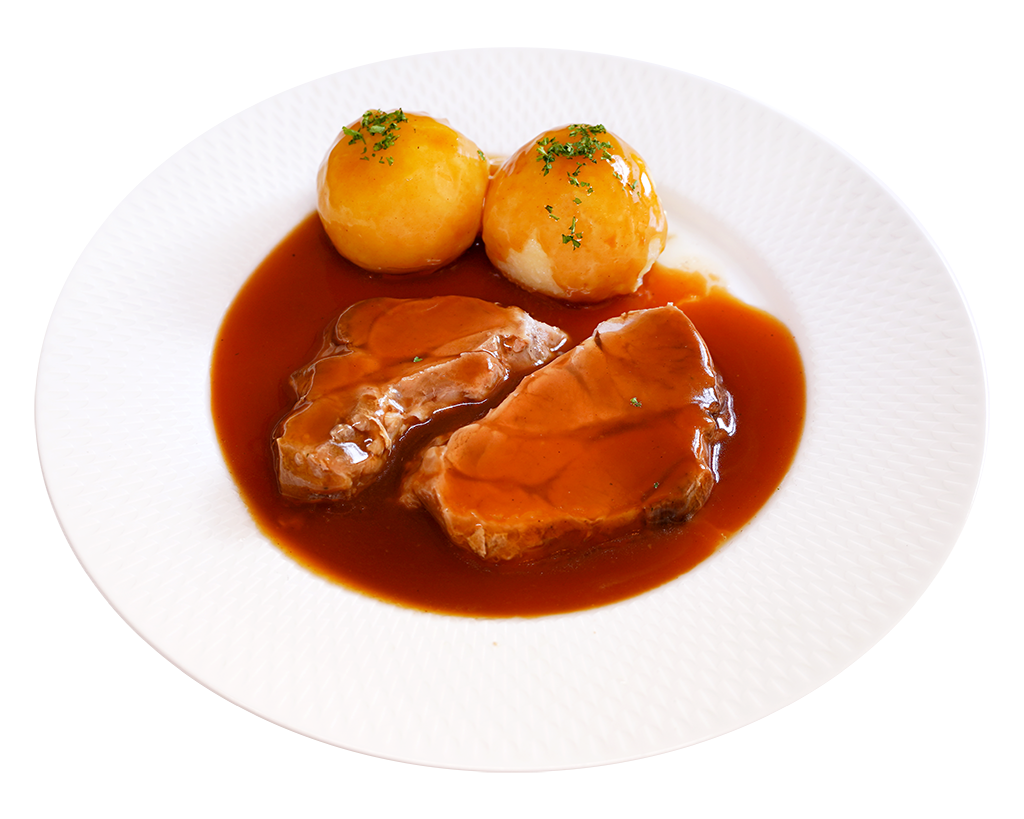 Schweinebraten mit Klößen und Bratensoße Zwei Scheiben Schweinebraten in Bratensoße mit Kartoffelklößen, garniert mit Petersilie